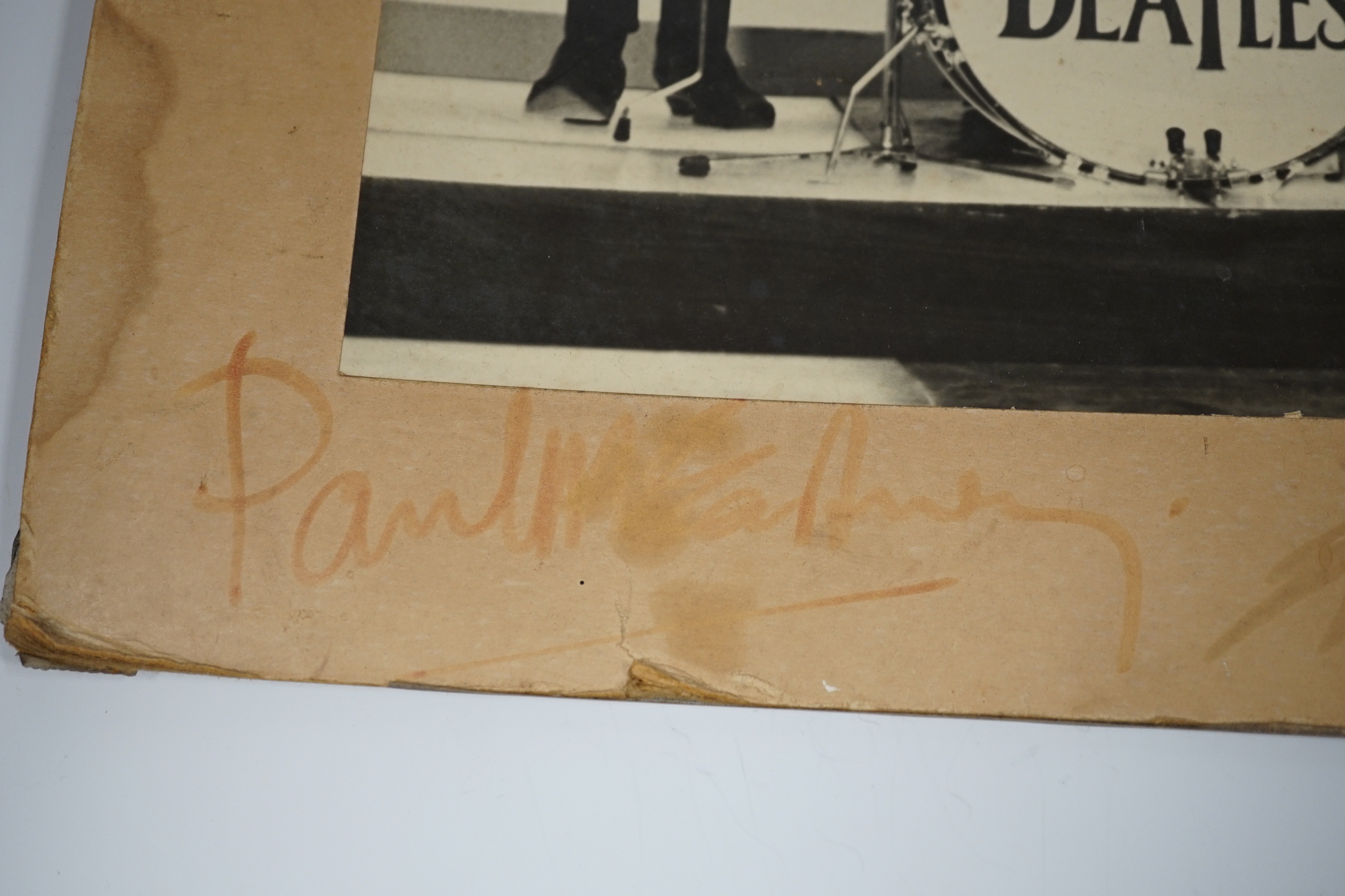 A fully signed mid-1960s The Beatles photo, signed to the original mount to which the photograph is glued